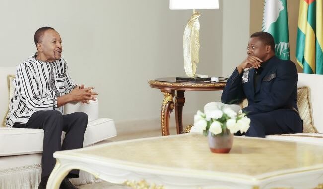 Le président Faure Gnassingbé et Dr Paul Kammogne Fokam...